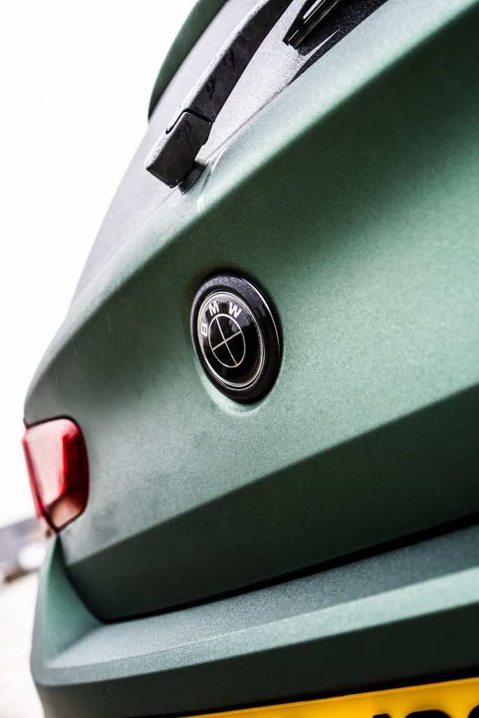 BMW M140i logo closeup