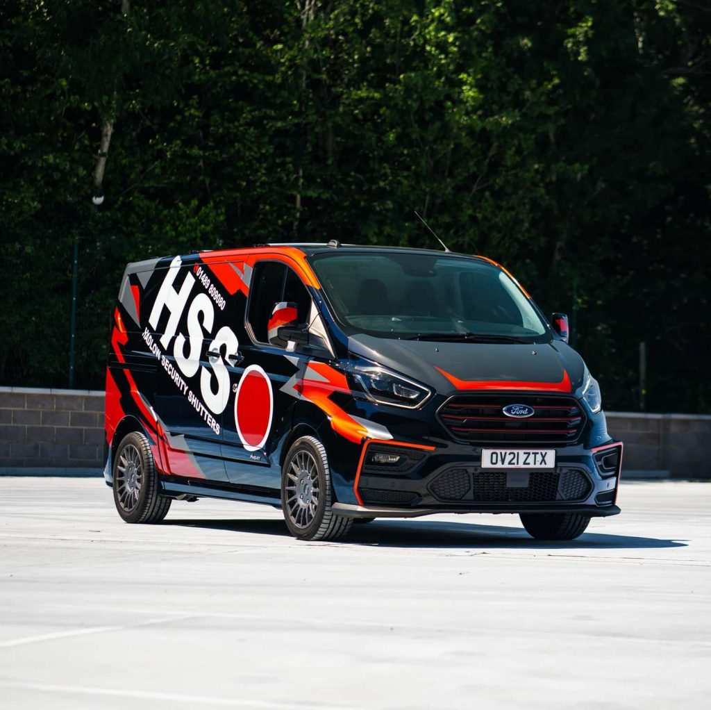 Customised Ford transit parked in open space