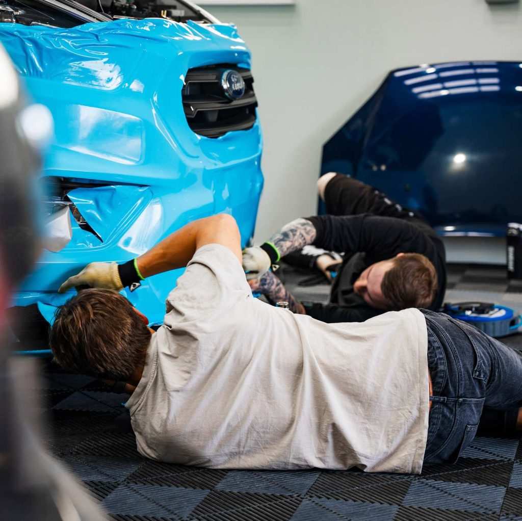 Workers Customising Ford Transit