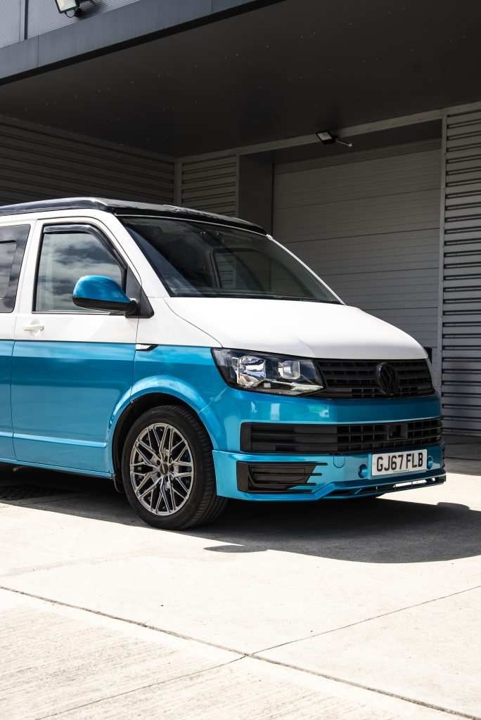 Side profile of VW T6 with atomic teal half wrap
