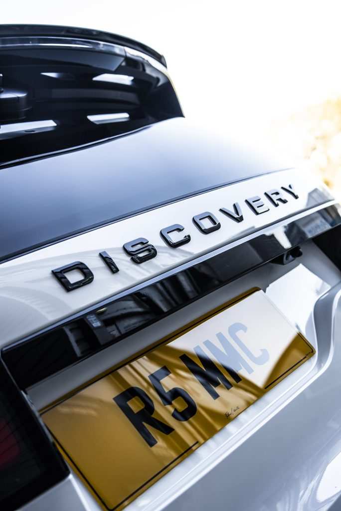 Luxury SUV wrapped in gloss white vinyl