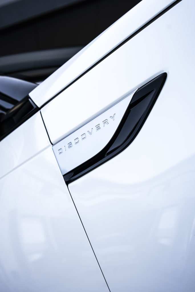 Luxury SUV wrapped in gloss white vinyl