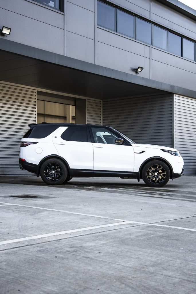 Side profile of Discovery in gloss white