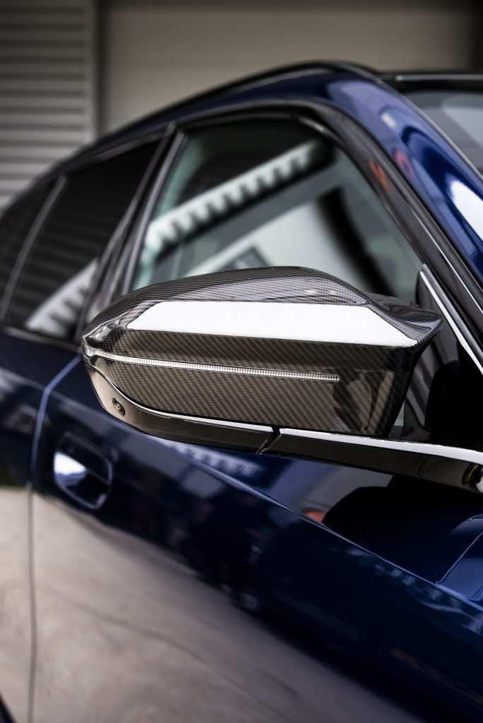 Close-up of BMW M5 Touring gloss PPF finish
