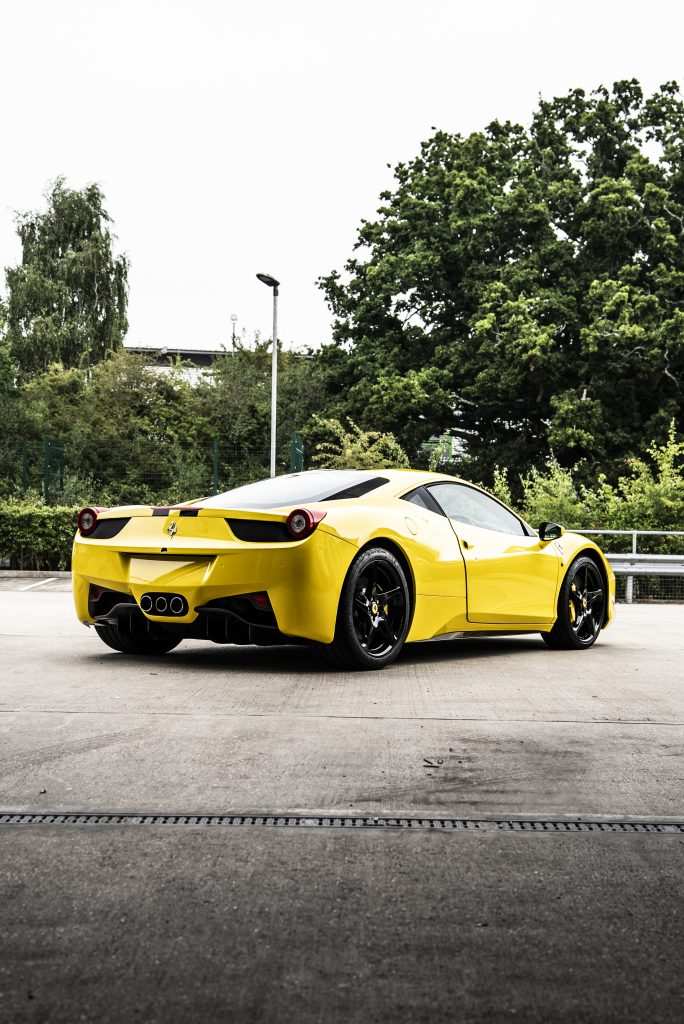 Side profile of Ferrari 458 in gloss yellow