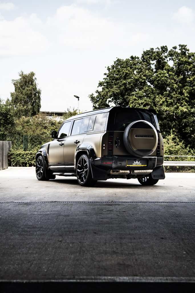 Land Rover Defender wrapped in matte gold with Urban styling kit
