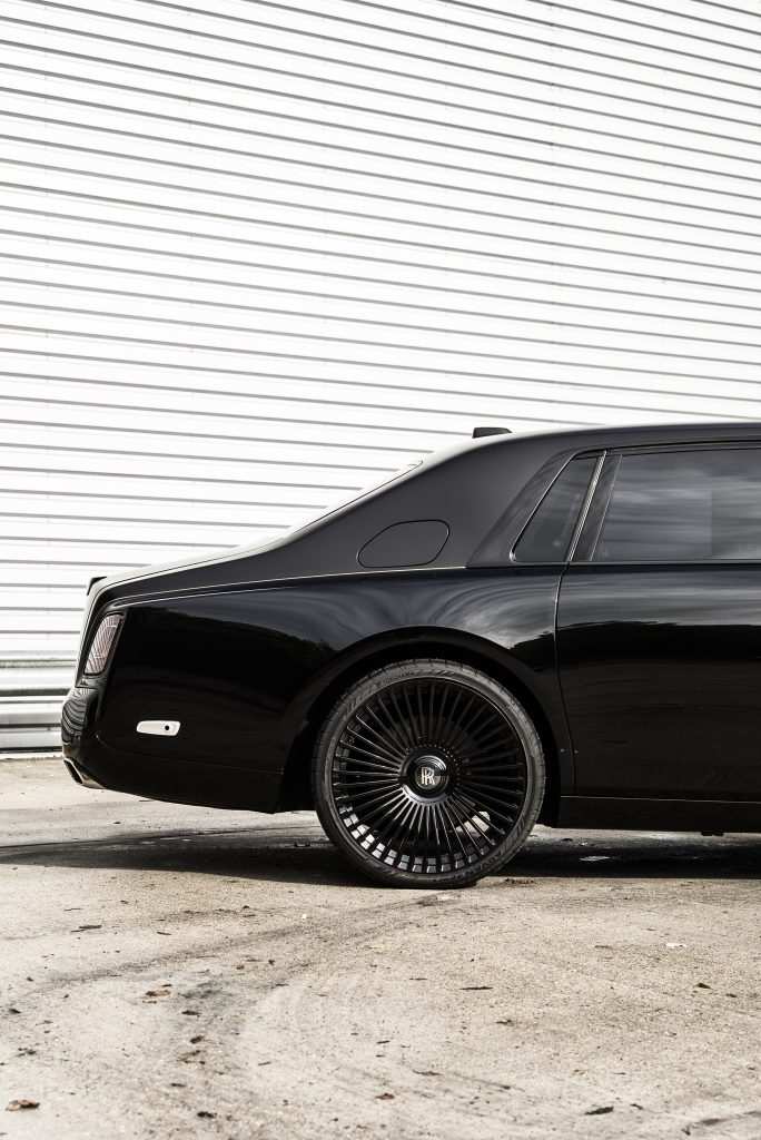 Side profile of Rolls Royce Phantom dechromed with satin black wrap