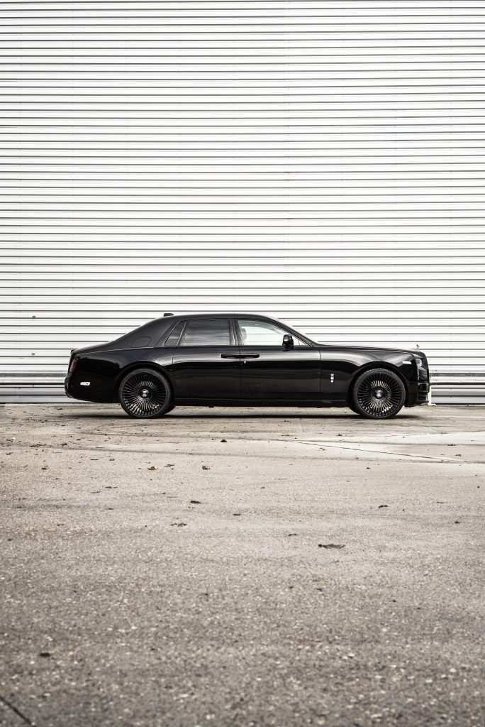Side profile of Rolls Royce Phantom dechromed with satin black wrap