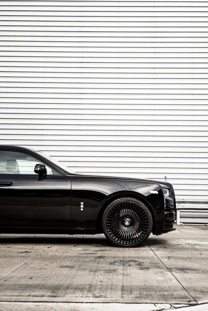 Side profile of Rolls Royce Phantom dechromed with satin black wrap