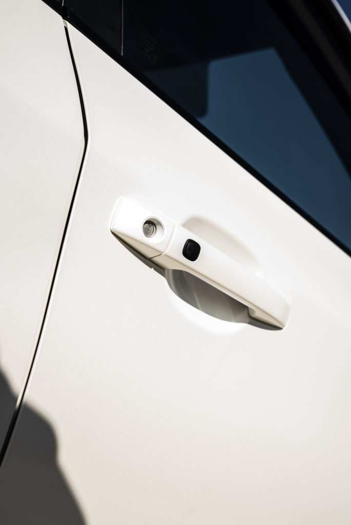 Car wrapped in satin pearl white vinyl